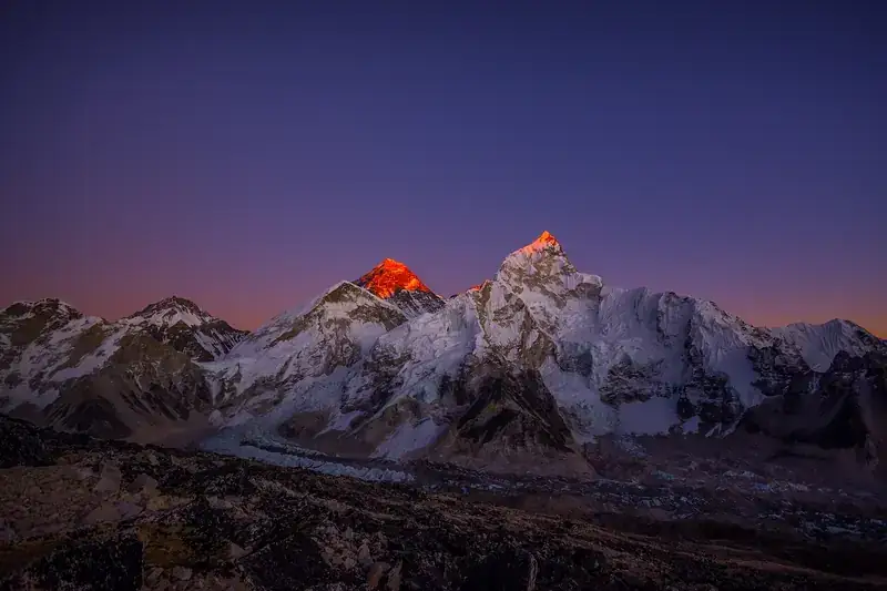 Sunset light on the summits of Everest and Nuptse above the Khumbu